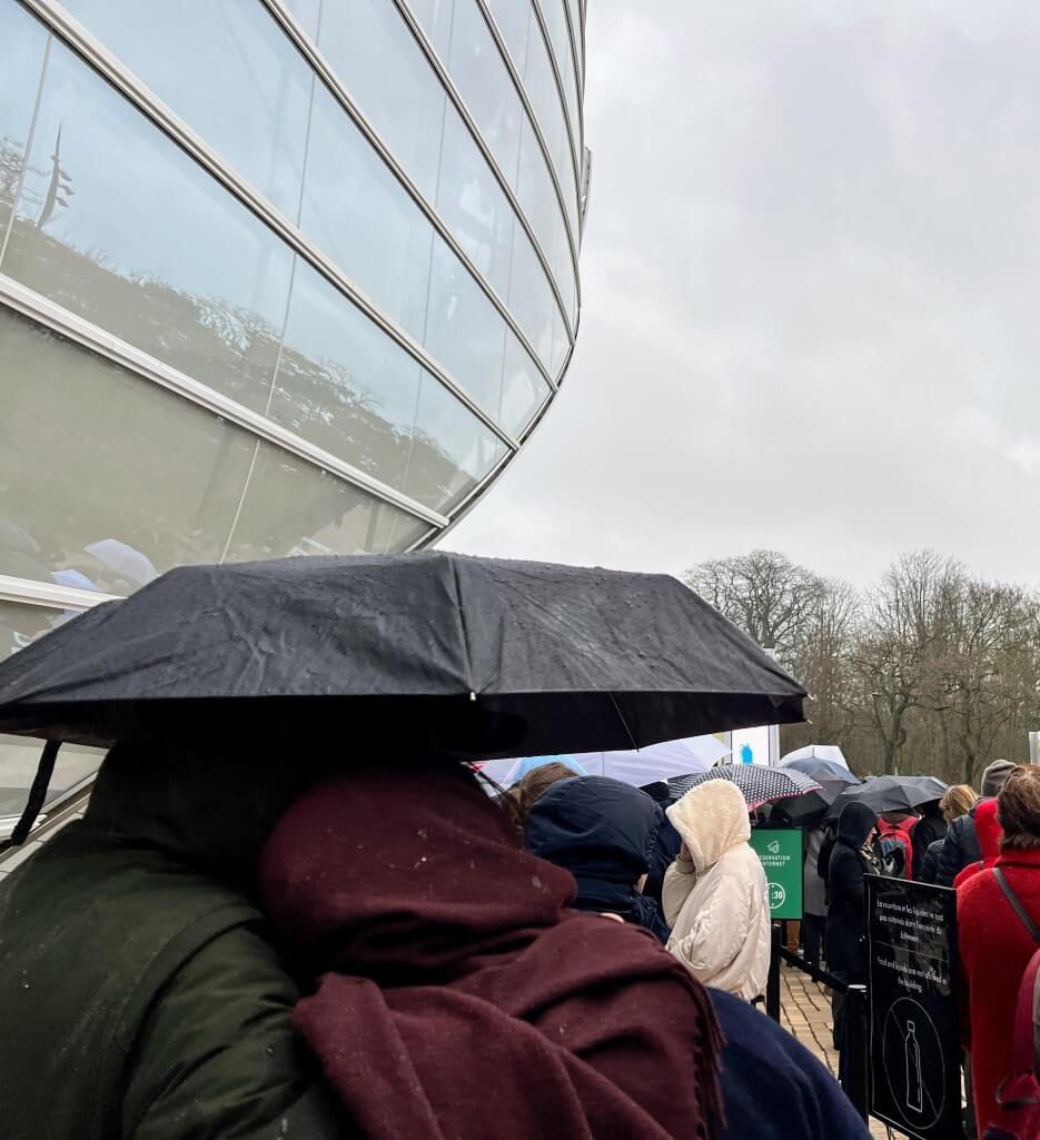 Waiting in line in the rain to enter the Fondation Louis Vuitton for the Monet Mitchel exhibit in Paris
