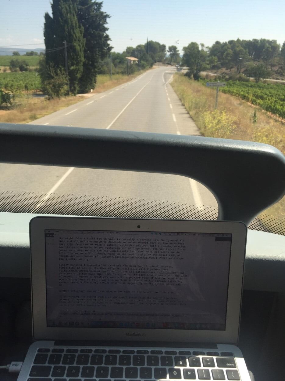 Adrian Leeds on her laptop even while riding on a bus in France
