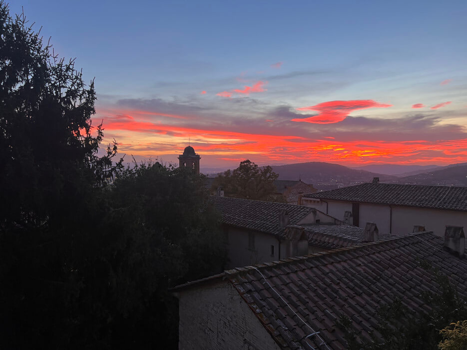 Sunset from Cousin Leslie's window—a view of Perugia at dusk
