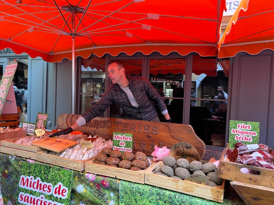 Charcuterie stand at the market in Annecy, France