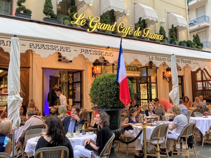 Outdoor seating at Le Grand Cafe de France in Paris