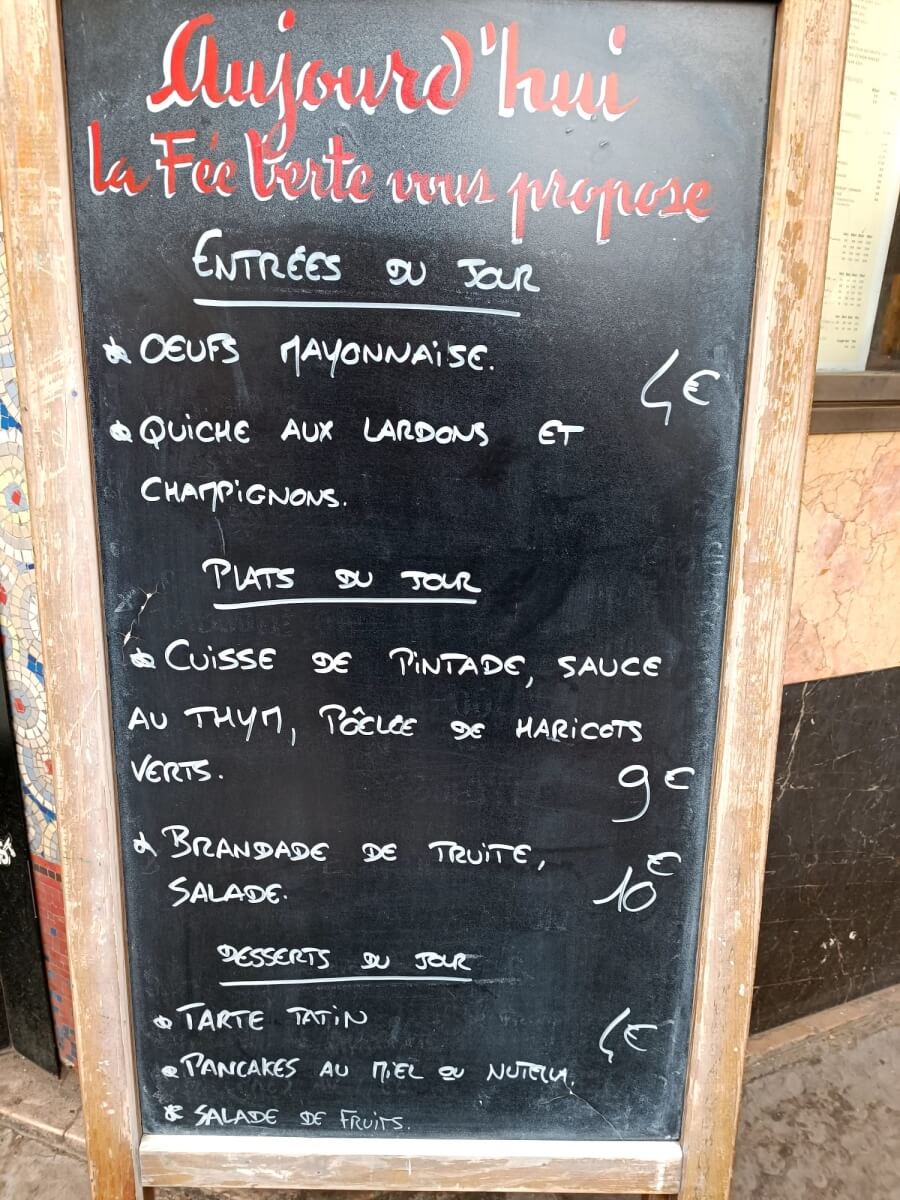 A sidewalk Menu du jour board in Paris