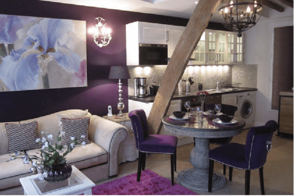 The living room and kitchen in La Fleur de Poitou, apartment for sale in Paris