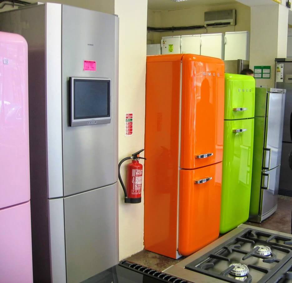 Several large, American style refrigerators