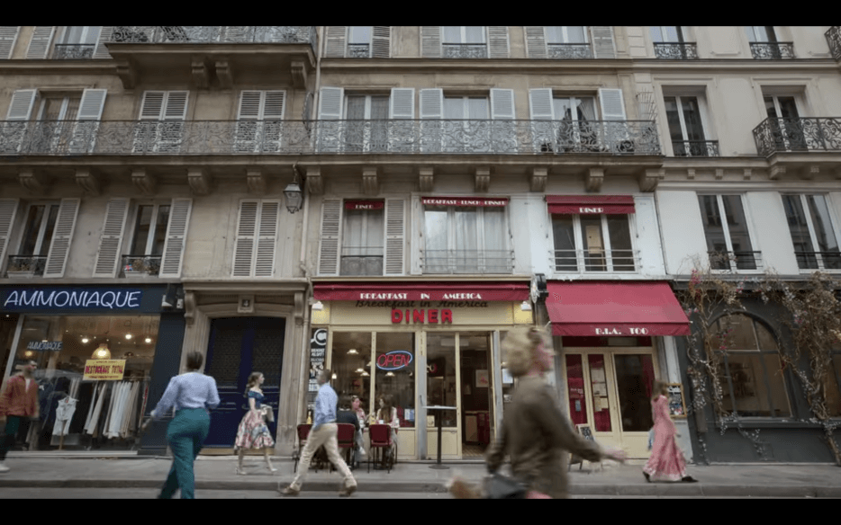 Emily in Paris in front of Breakfast in America