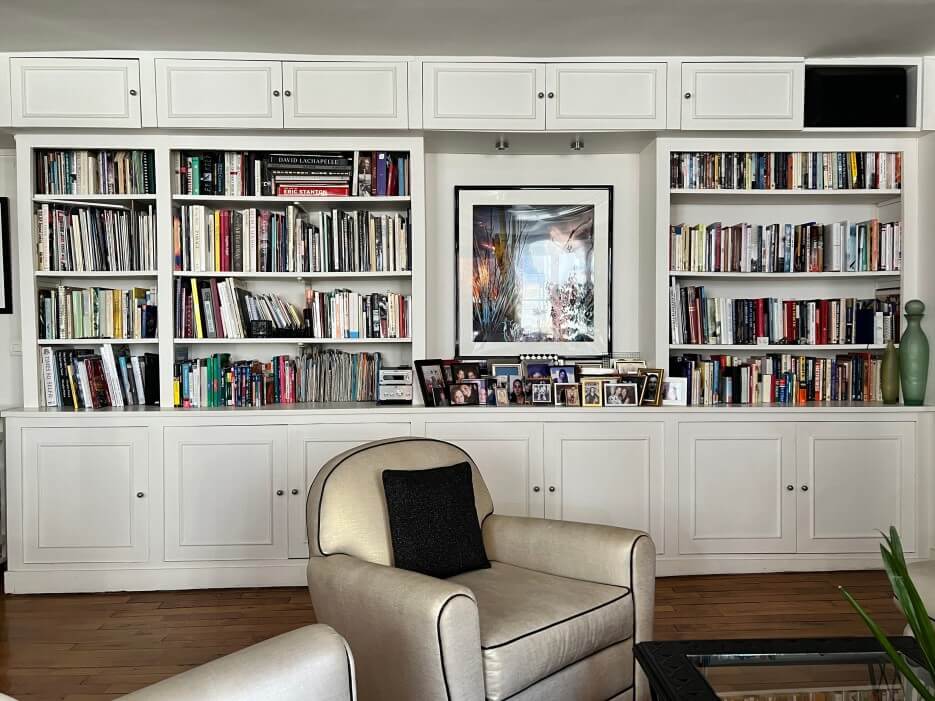 The builtin book shelves and cabinets in Adrian Leeds' apartment in Paris