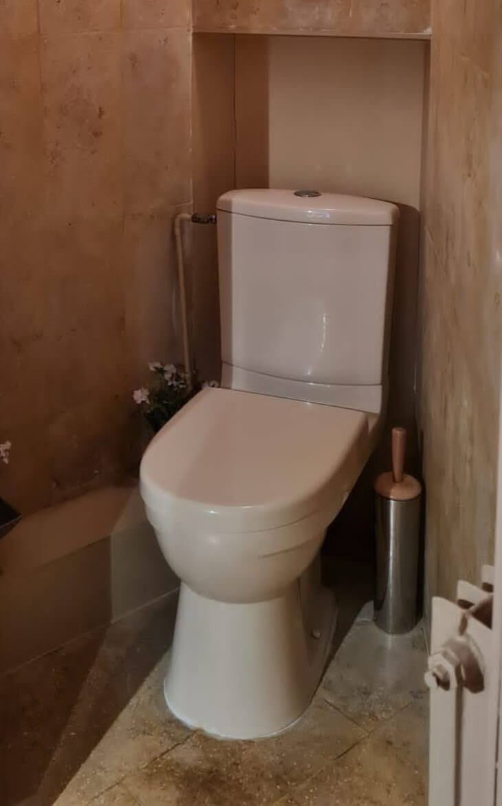 Awkwardly positioned toilet