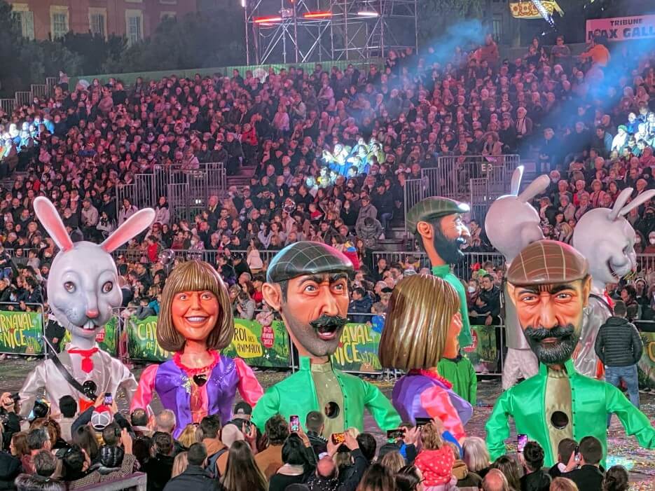 Costumes with giant heads as part of Carnaval de Nice