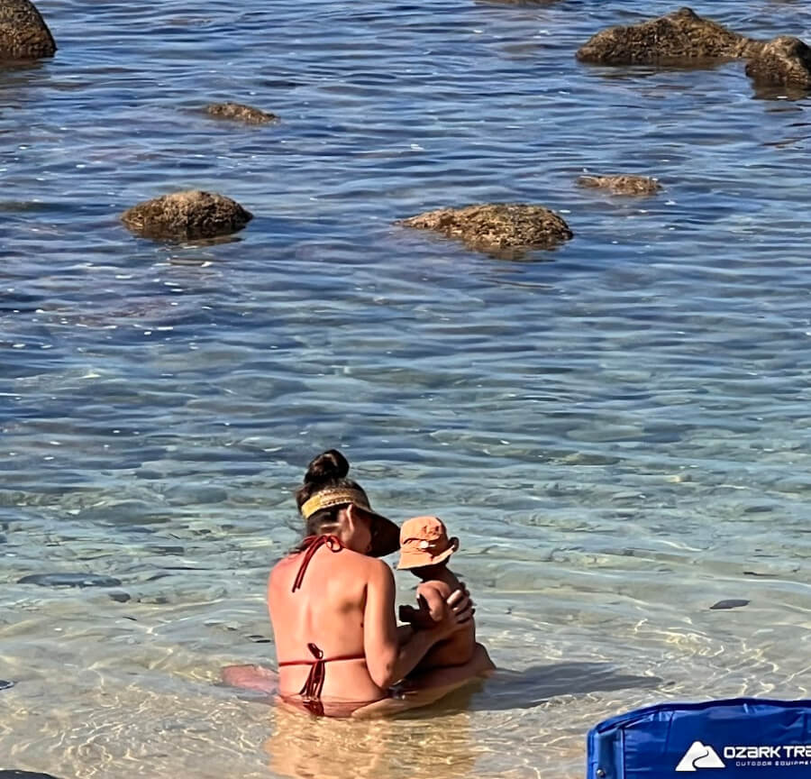 Adrian Leeds' daughter, Erica, and her baby at the beach in Maui, Hawaii
