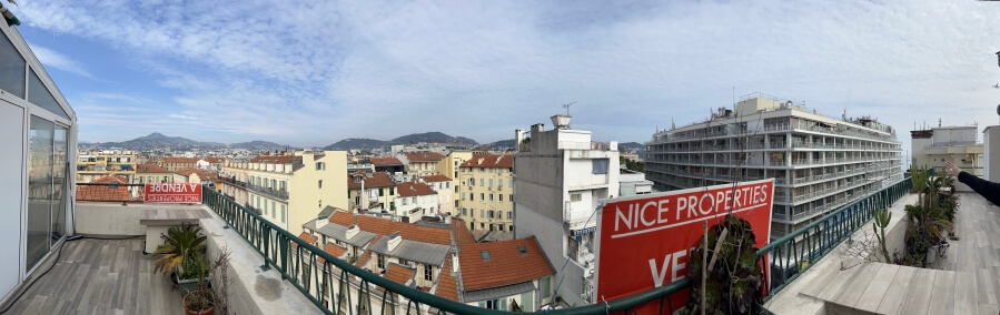 A Vendre, for sale sign on an apartment building in France
