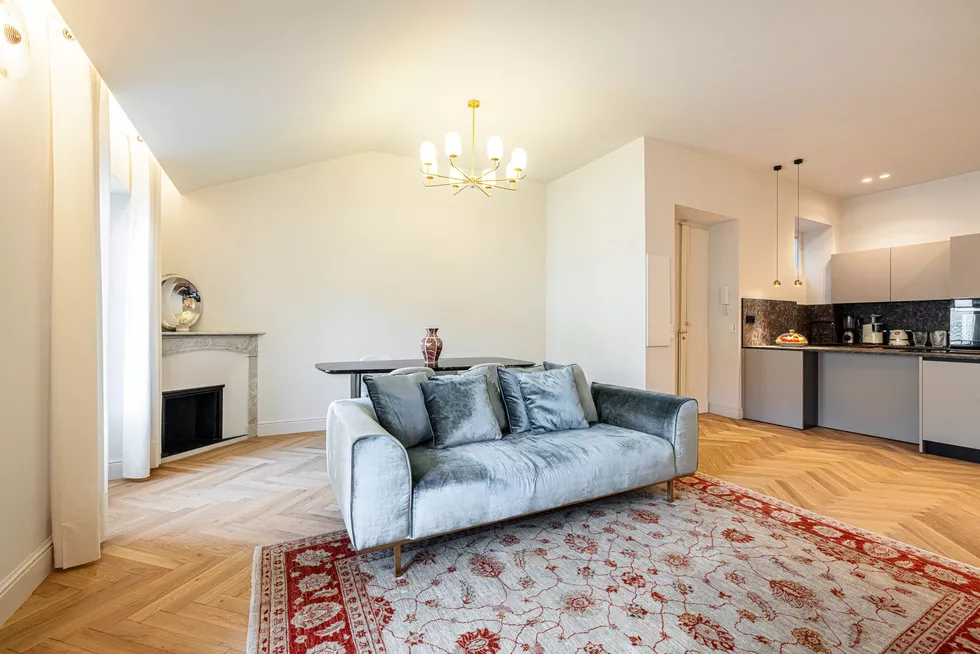 Fireplace in dining living area of newly renovated apartment 20 avenue du Maréchal Foch Nice