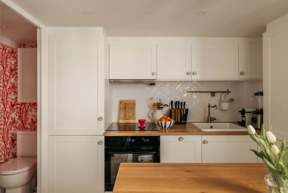 Kitchen details with over and large sink and storage Converted Carriage, 25 Rue Saint-Dominique Paris