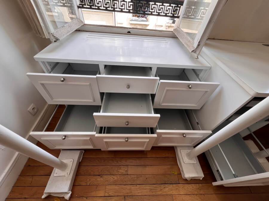 The huge amount of storage space in the desk in Adrian Leeds' apartment in Paris