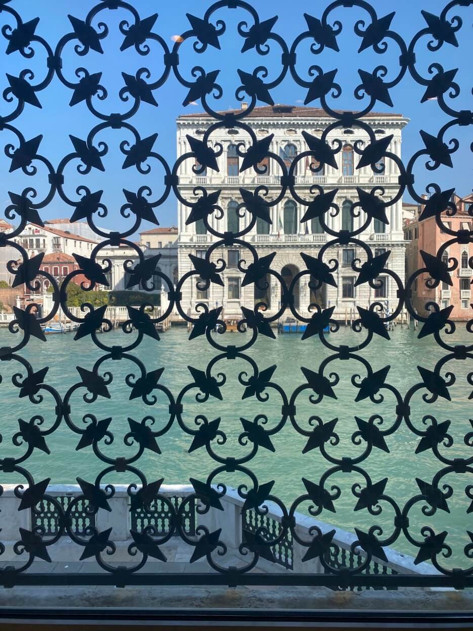 View of the Grand Canal through a window in the Peggy Guggenheim Collection in Venice, Italy