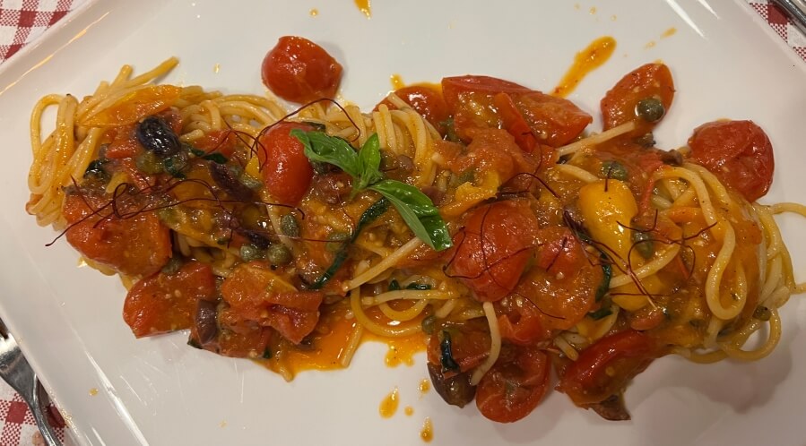 Specially made Spaghetti alla Puttanesca for Adrian Leeds at Malatia in Naples, Italy