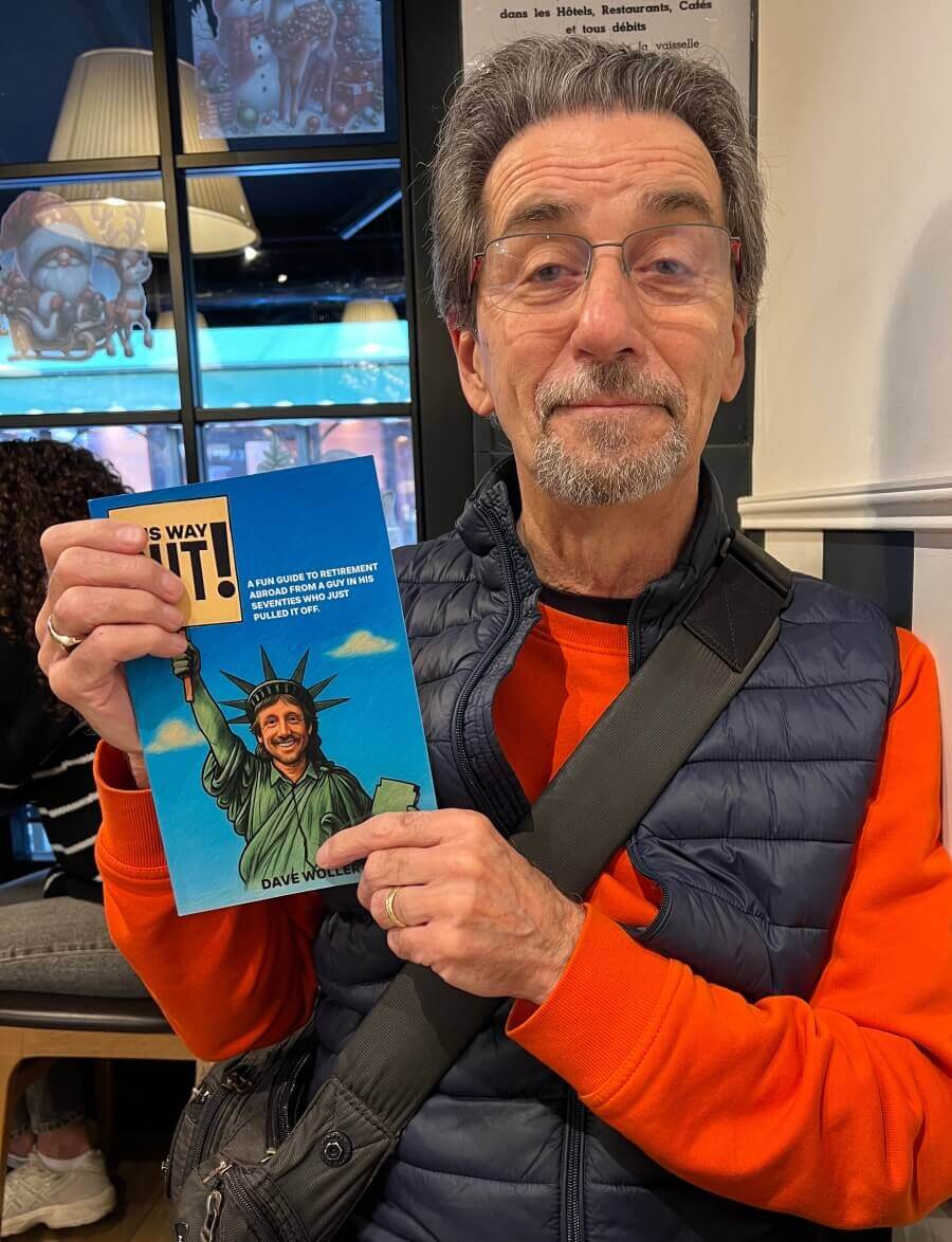 Dave Wollert with his book, This Way Out!