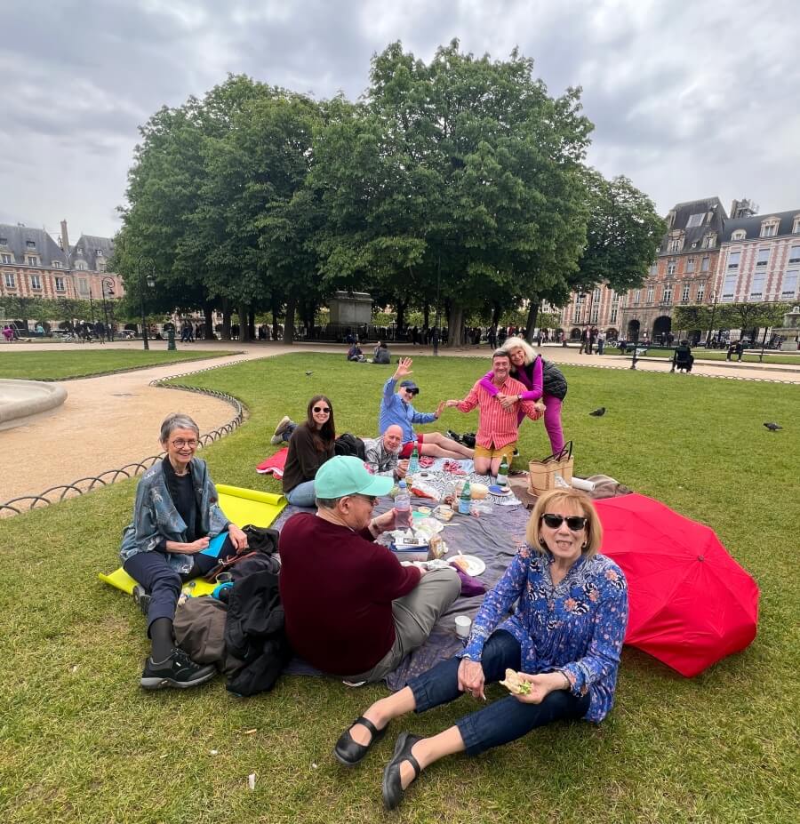 Adrian Leeds' picnic on the grass at Place des Vosges 2024 in Paris