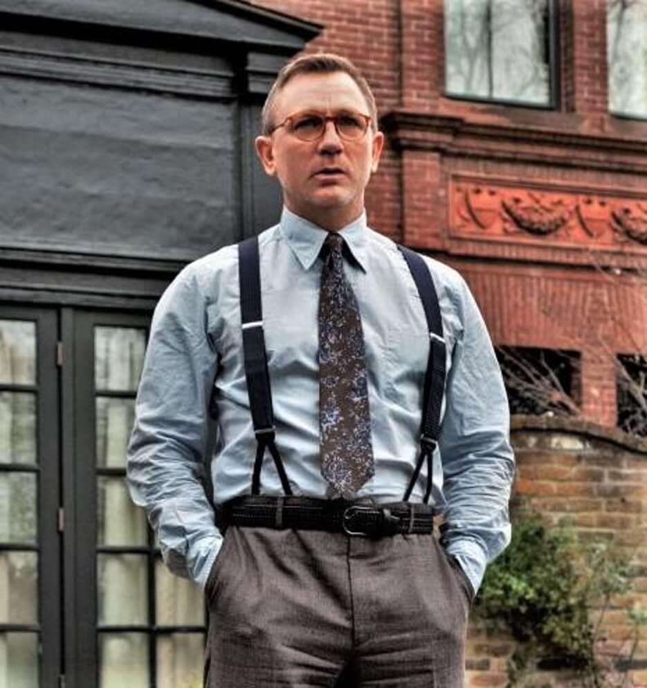 Daniel Craig wearing a belt and suspenders