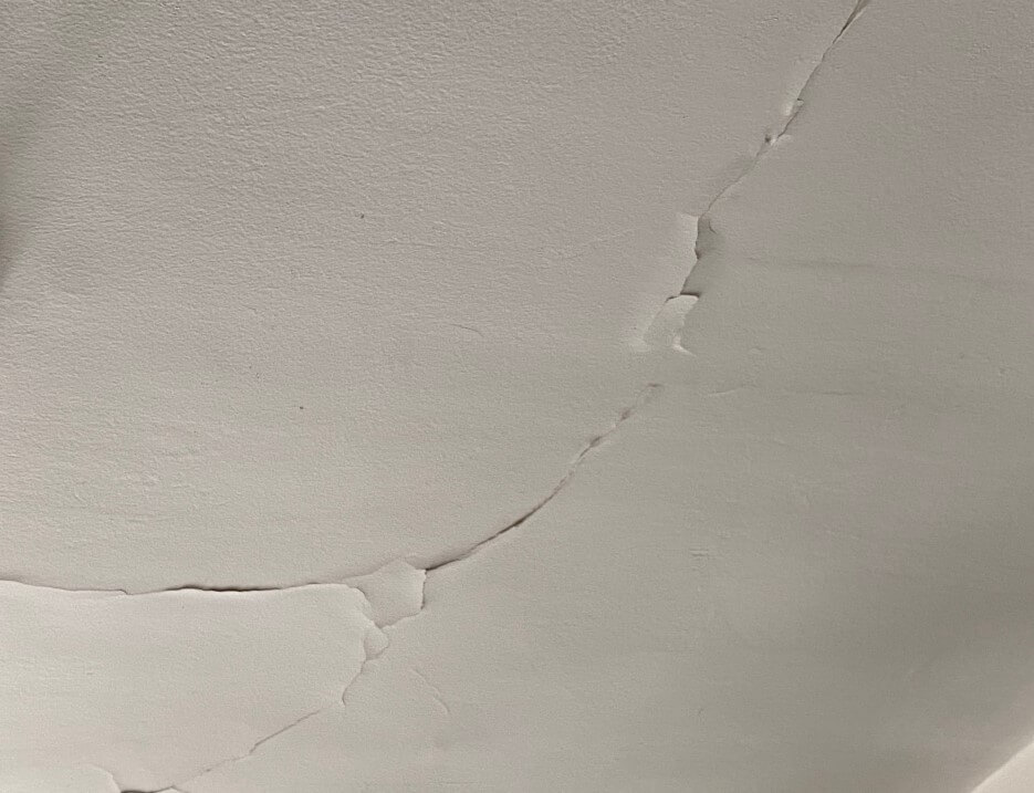 Cracks in the ceiling of Adrian Leeds' apartment in Paris France