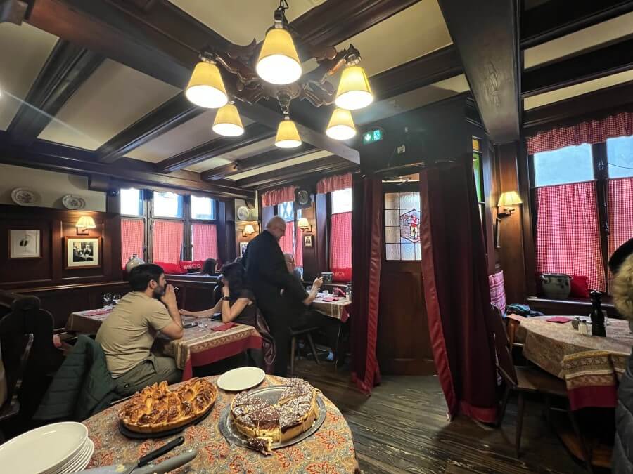 The cozy interior of Chez Yvonne in Strasbourg, France