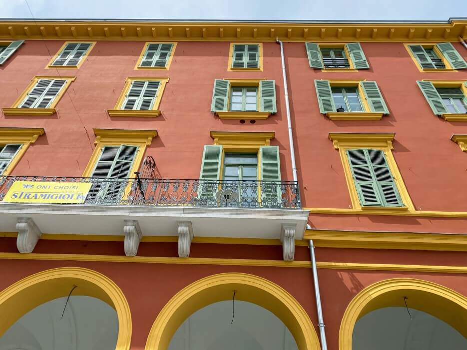 Photo of a colorful apartment building in Nice France