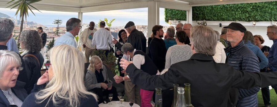 The large group gathered at the Hôtel Splendid & Spa in Nice, France for the Dunhill Financial cocktail event with Adrian Leeds