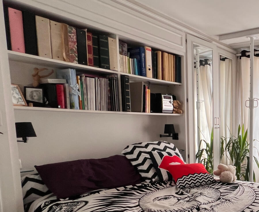 Adrian Leeds' Bookshelves full of photo scrapbooks