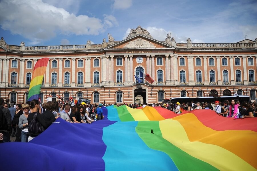 Huge Pride flag celebrating Gay Pride in Paris, France
