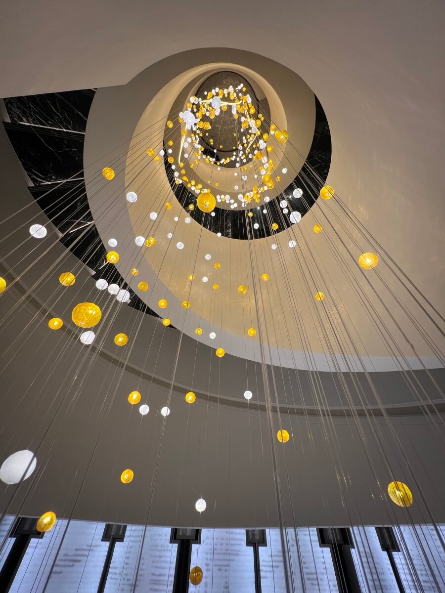 The stairwell and chandelier in the Hotel Victoria in Nice, France