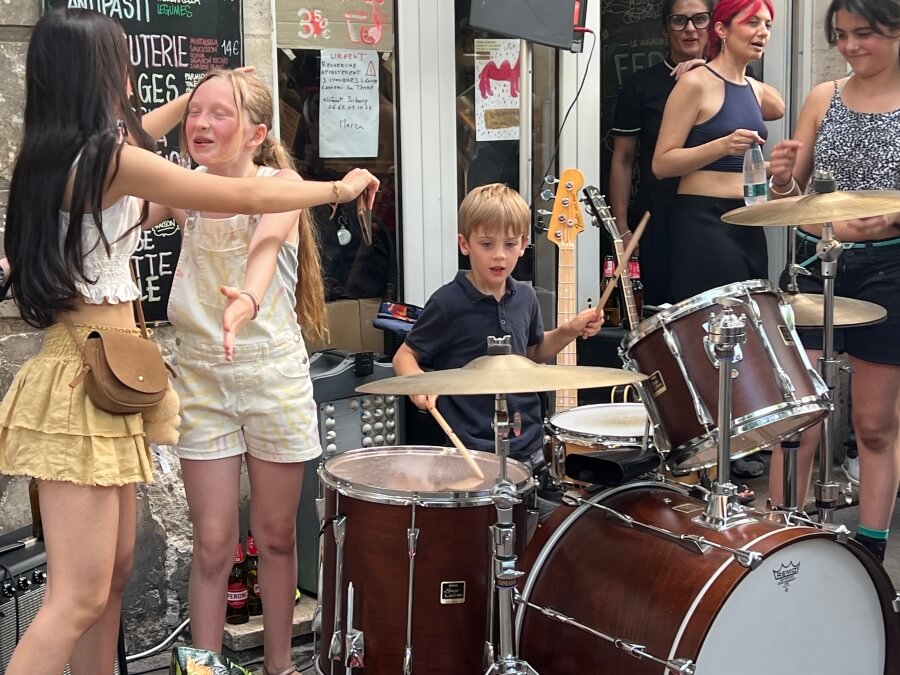 Kid banging his drums at Fête de la Musique in Nice, France
