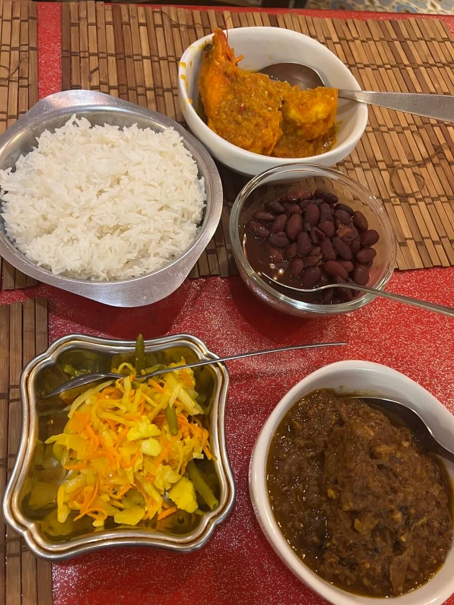 Shrimp, pork, rice, beans, and salad at Le Barachois in Nice, France