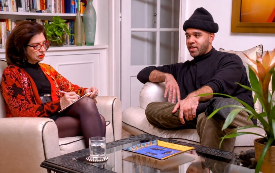 Screenshot of Adrian Leeds with a client for an episode of House Hunters International