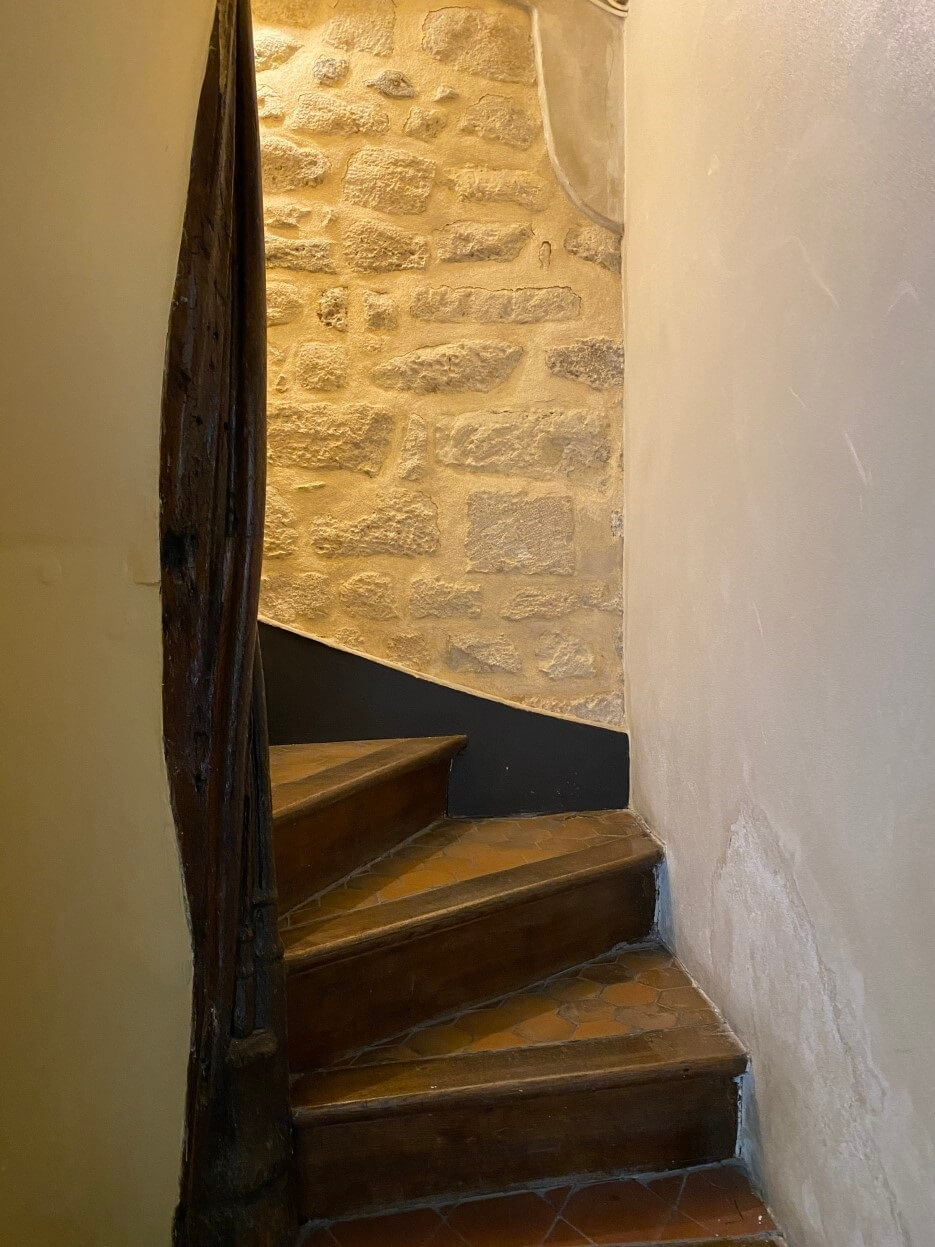View of the stairway up to the apartment for sale in Paris