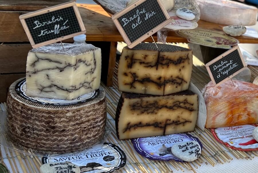 A selection of French cheeses at a street market