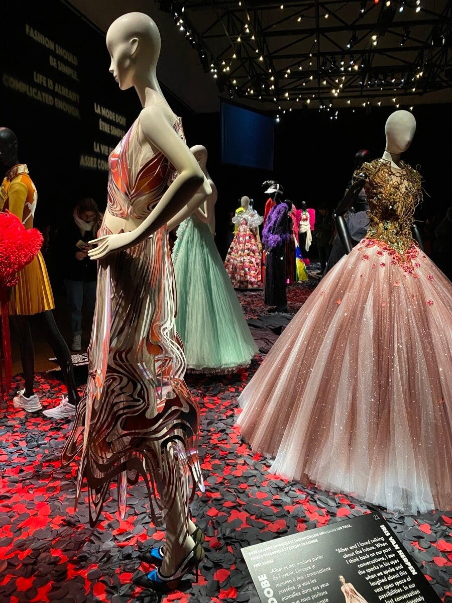 Manicans displaying a collection of gowns for fashion week in Paris