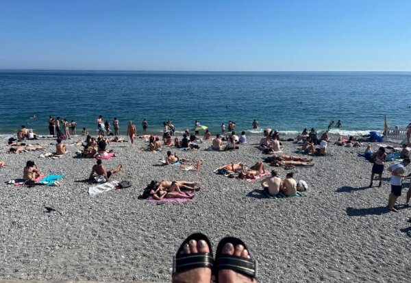 Adrian Leeds on a public beach in Nice, France