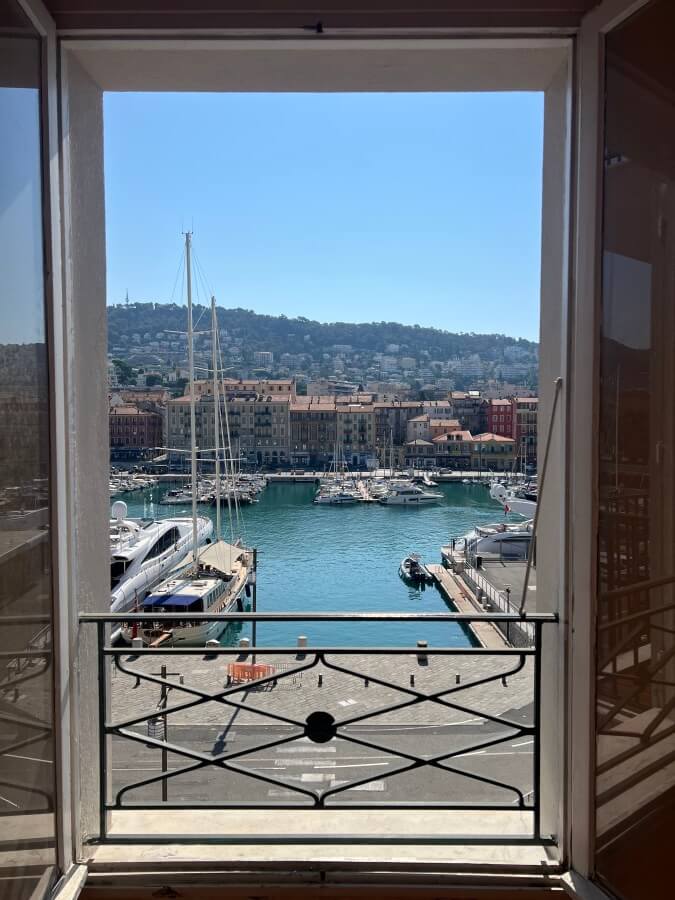 View of the port from the bedroom window in the new Fractional Property, La Perle du Port in Nice, France