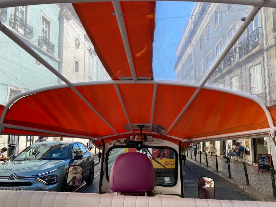 The view from the back of the Tuk Tuk in Lisbon