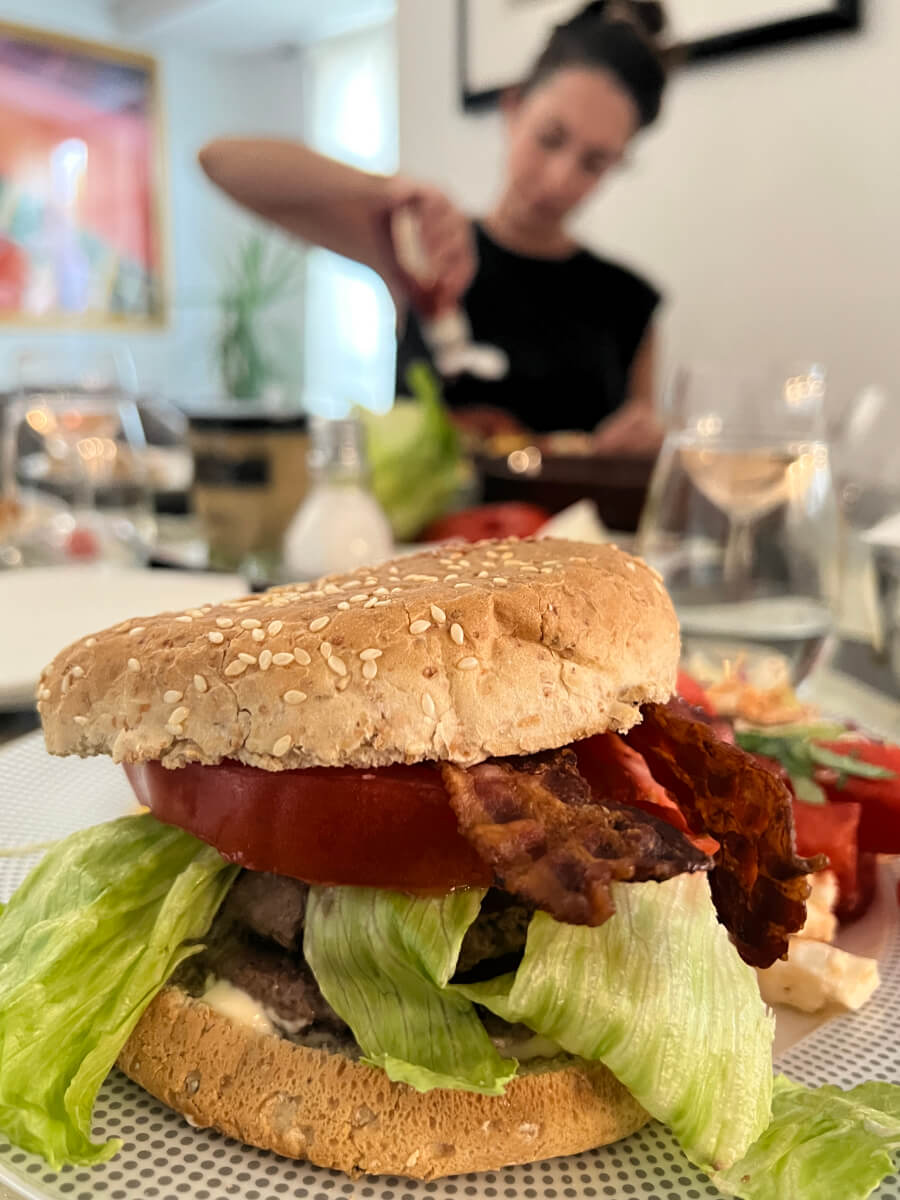 Adrian Leeds' daughter, Erica, making burgers for lunch