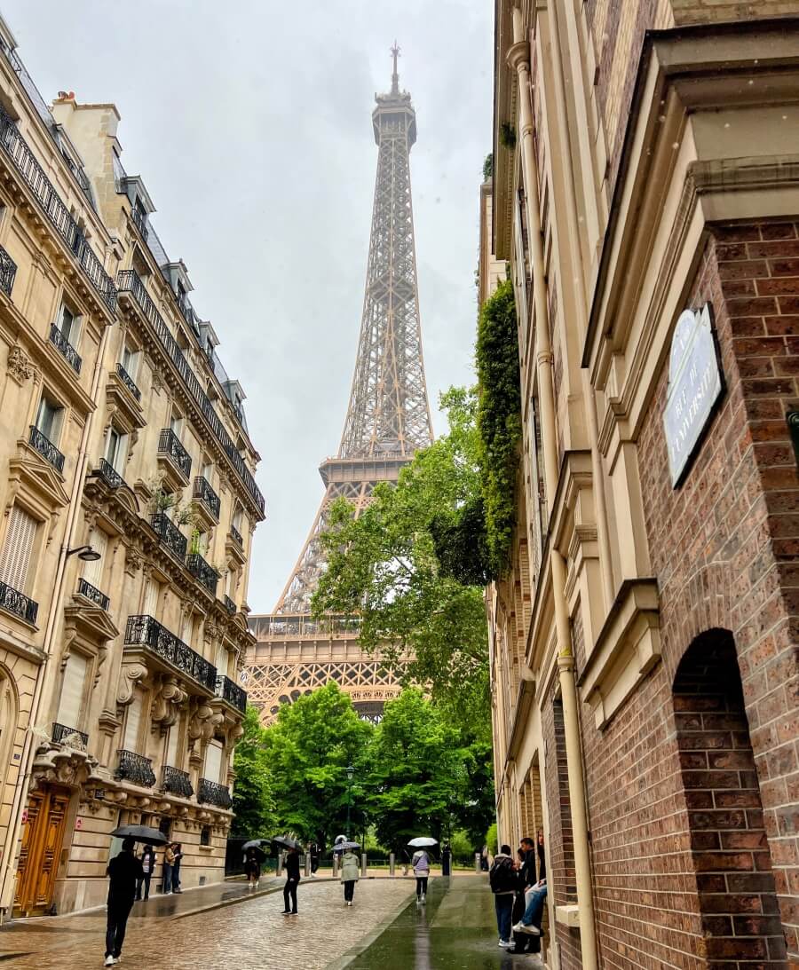 View of the Eiffel Tower down a street in the 7th arrondissement