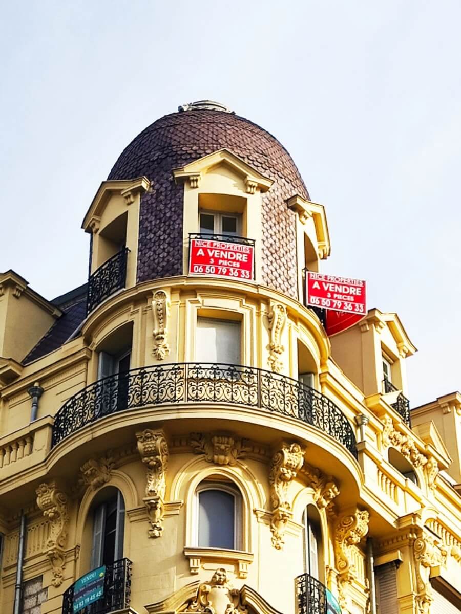 A Vendre, for sale sign on an apartment building in Paris