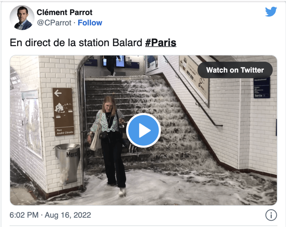Photo of rain water cascading down the Metro stairs at a station in Paris