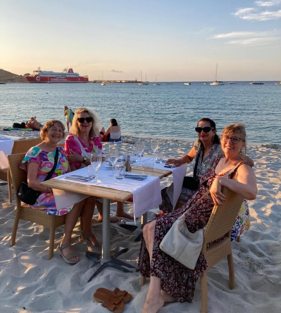 Adrian Leeds and friends dining on the beach at Le Grade Large