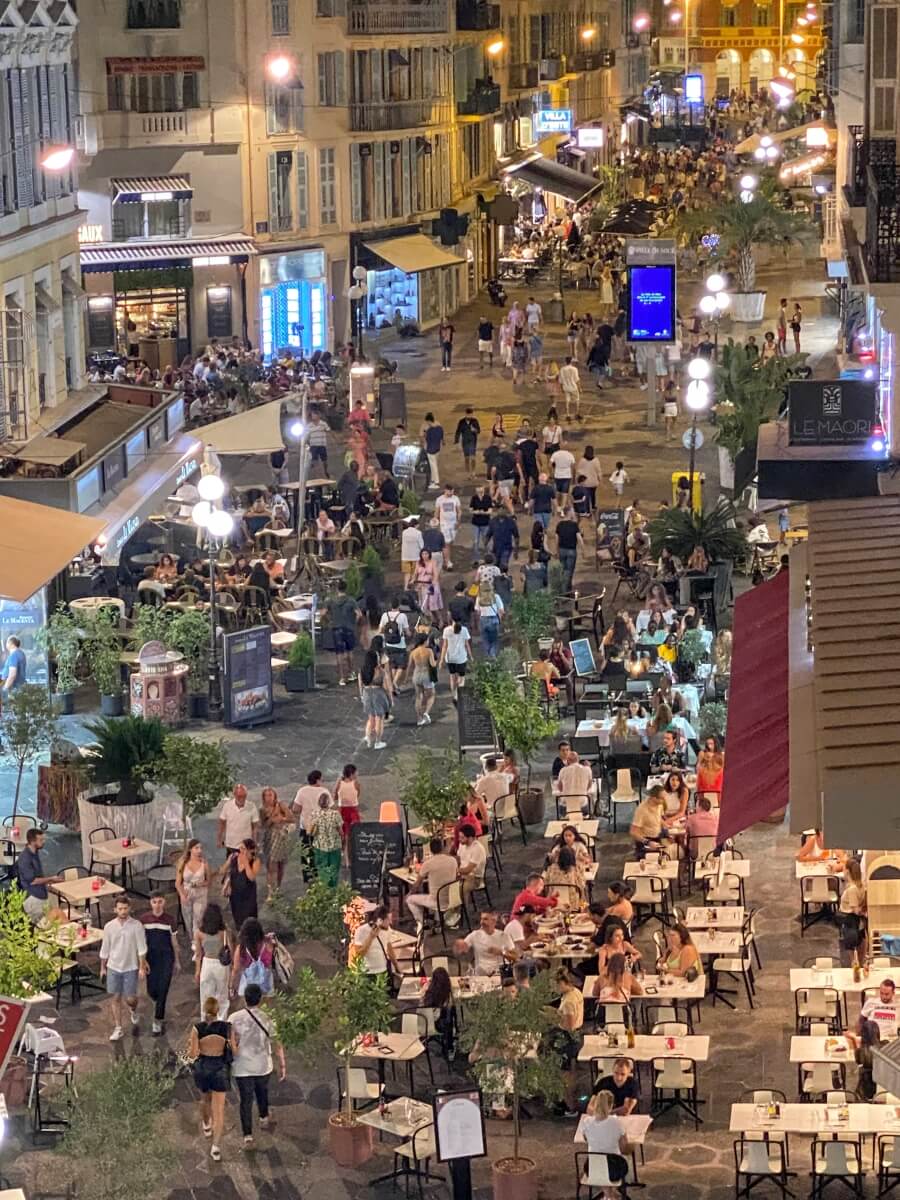 Crowds on rue Masséna in Nice, France
