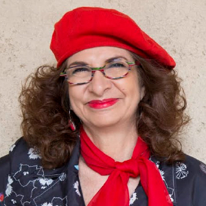 Adrian Leeds in her signature red beret