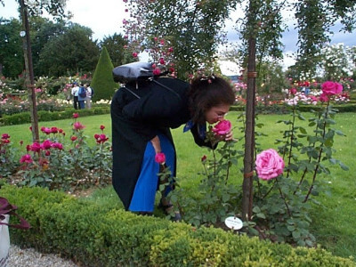 Adrian Leeds smelling the roses at the Bagatelle Gardens