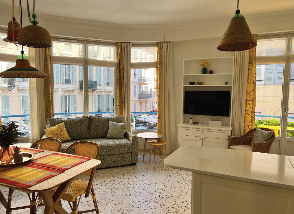 Curved living with large windows at Le Palais du Soleil in Nice, France