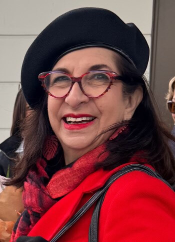 Adrian Leeds in a signature red beret