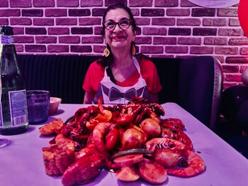 Adrian Leeds enjoying a meal at La Folie Crabe