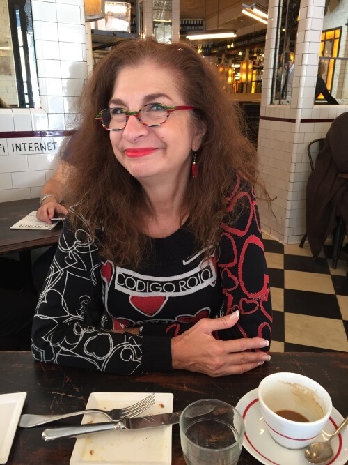 Adrian Leeds with an espresso at a cafe in Paris
